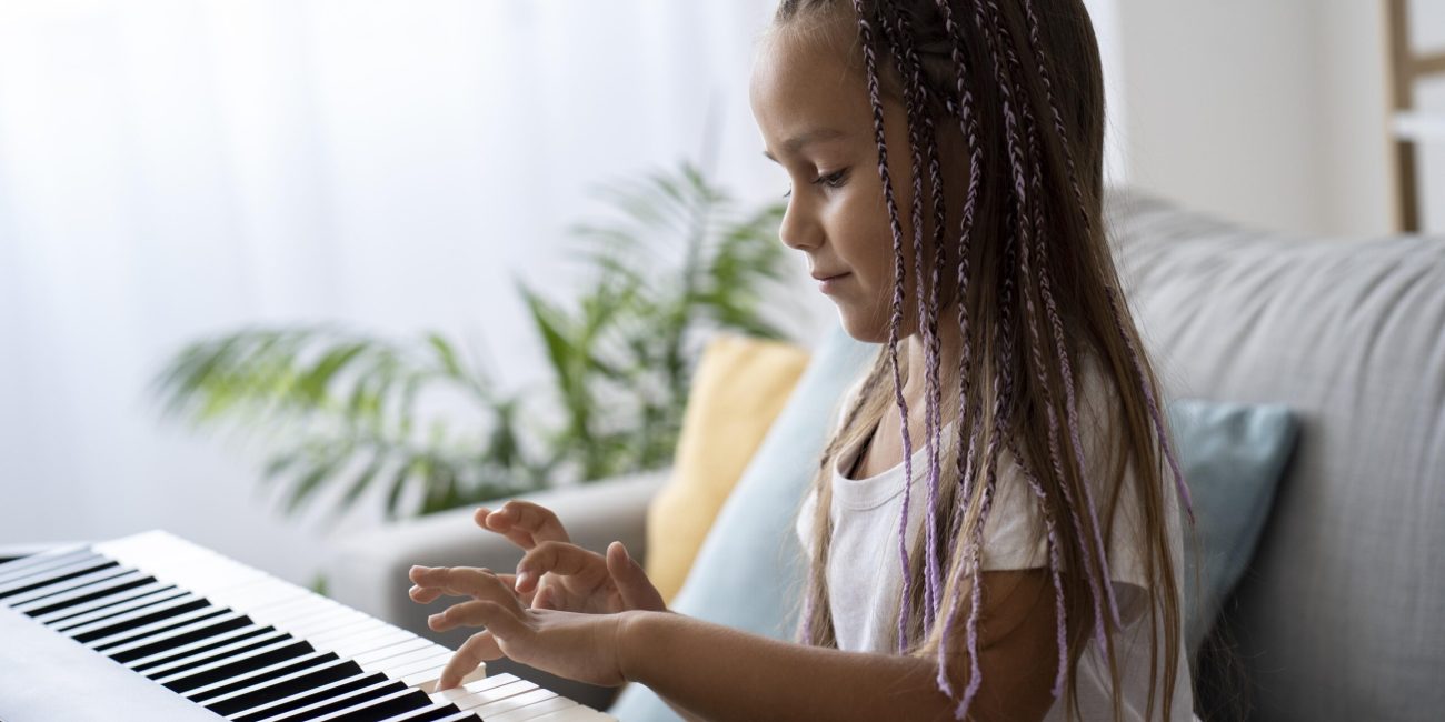 adorable-girl-playing-piano-home